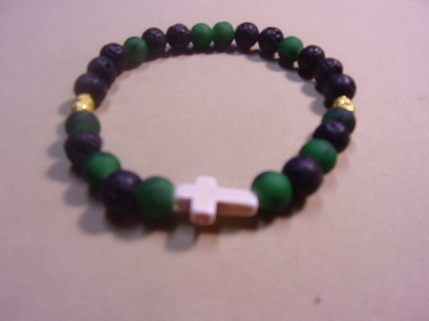 mans green/black w/white cross stone beaded bracelet