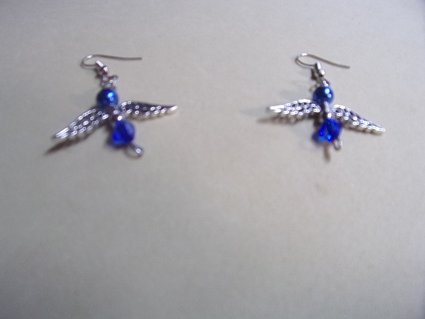 Angel birthstone fish hook earrings silver color