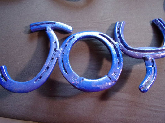 Joy desk top made with horseshoes